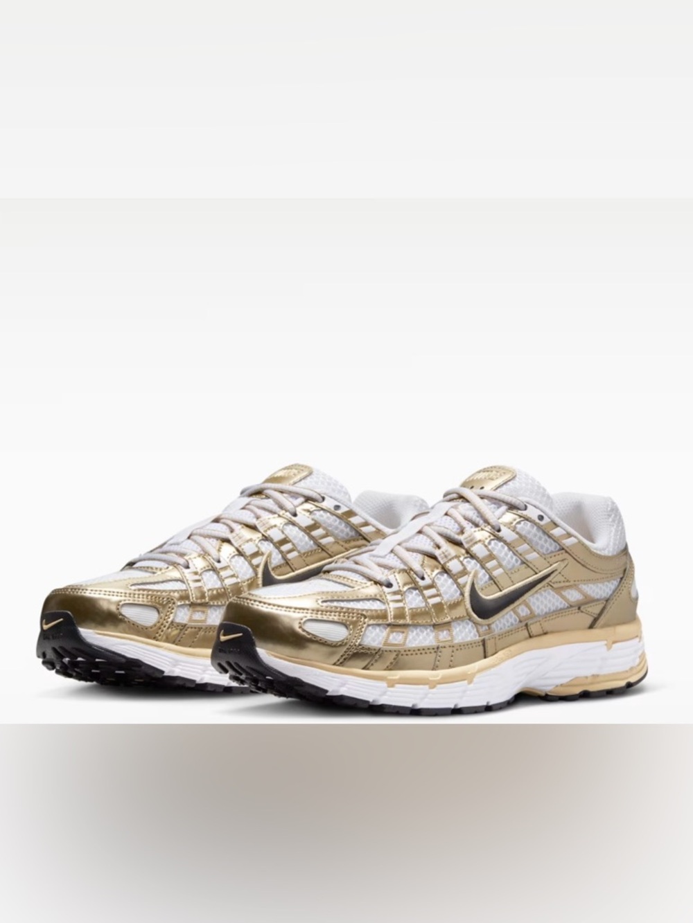 Nike Women’s Gold and White Mesh Running Sneakers